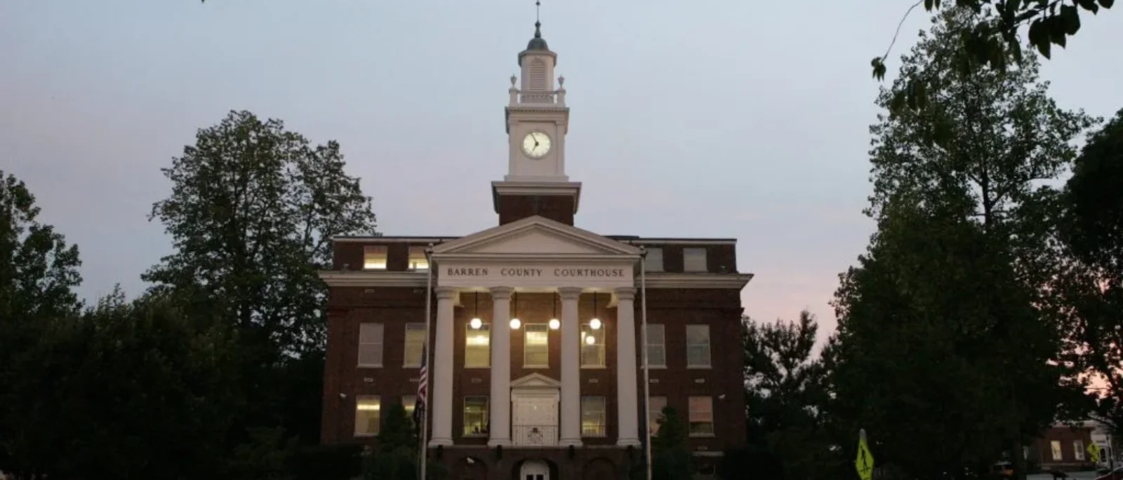 The historic Barren County Courthouse in downtown Glasgow, Kentucky, lit at dusk